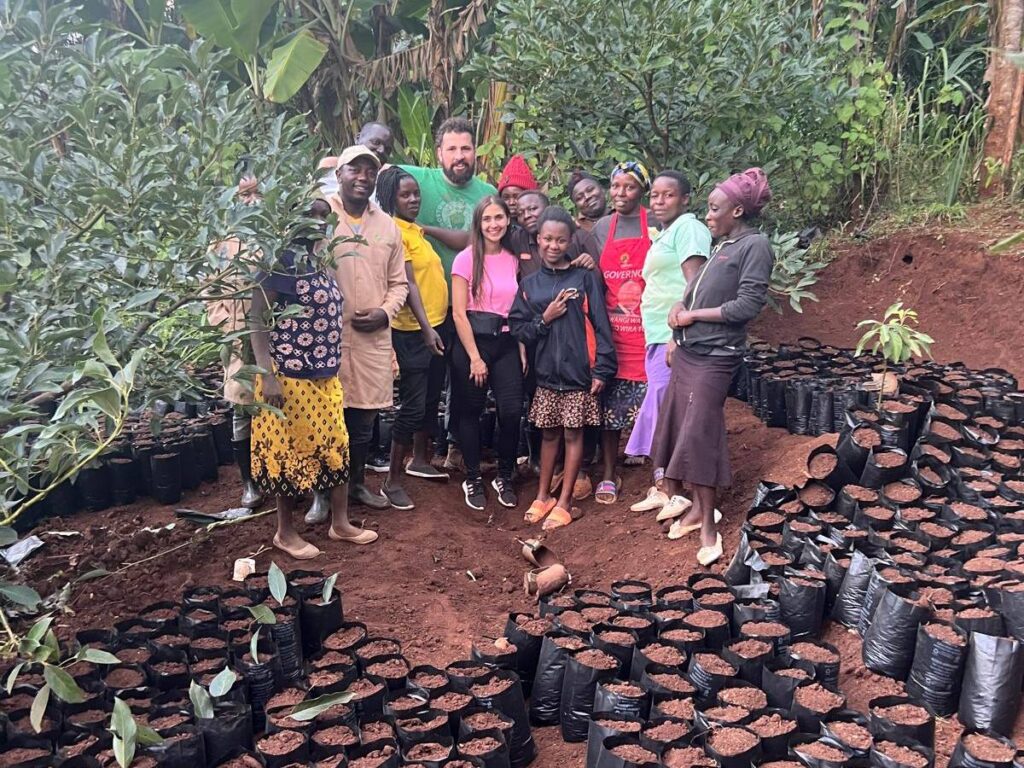 trainees pose for a picture at a farm during training 